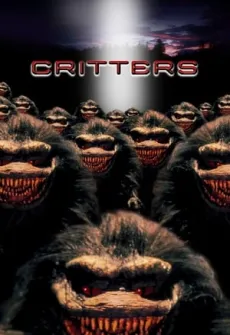 Portada de la película Critters (1986) (1986), una Película disponible para ver online en alta definición.
